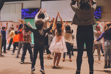 Children dancing in Children's Church